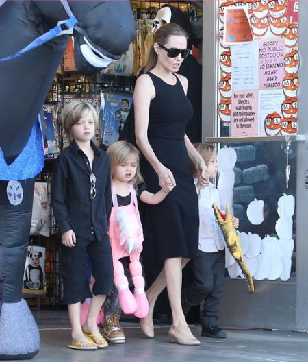 Angelina Jolie Halloween costume shopping with the kids