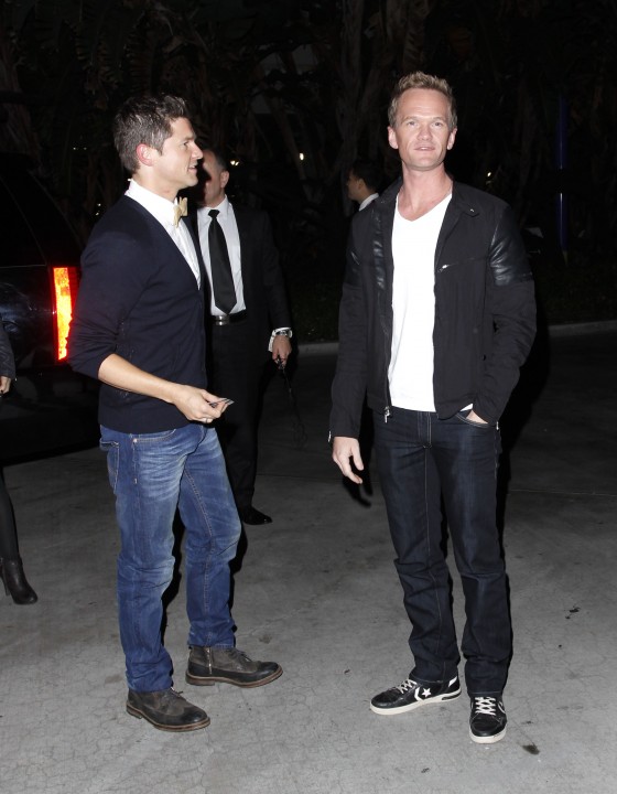 Neil Patrick Harris and David Butka attend Madonna concert
