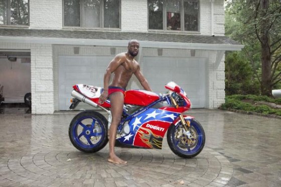 Wyclef jean poses nude on motorcycle