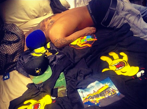 Chris Brown shirtless on bed