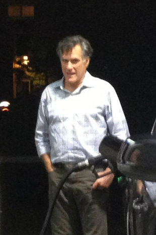 Mitt Romney pumping gas