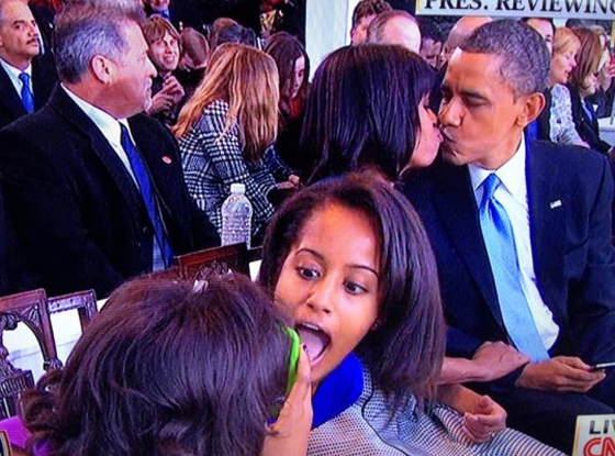 Malia photoboms Barack and Michelle Kissing