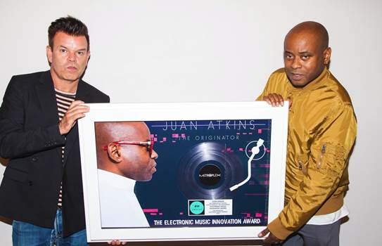 Celebrity DJ Paul Oakenfold presents Juan Atkins with the Electronic Music Innovation Award at the Night before VIP Party Hosted by ChefDance. 